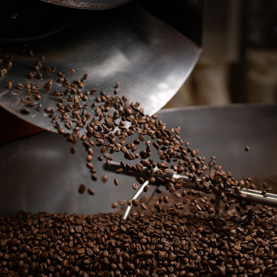 Beans falling into the roaster cooling tray