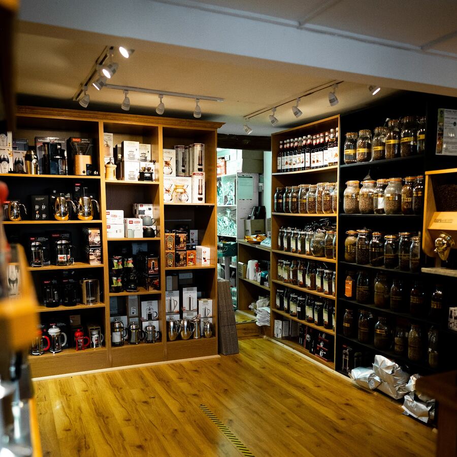 Shelves of coffee kit and jars of beans