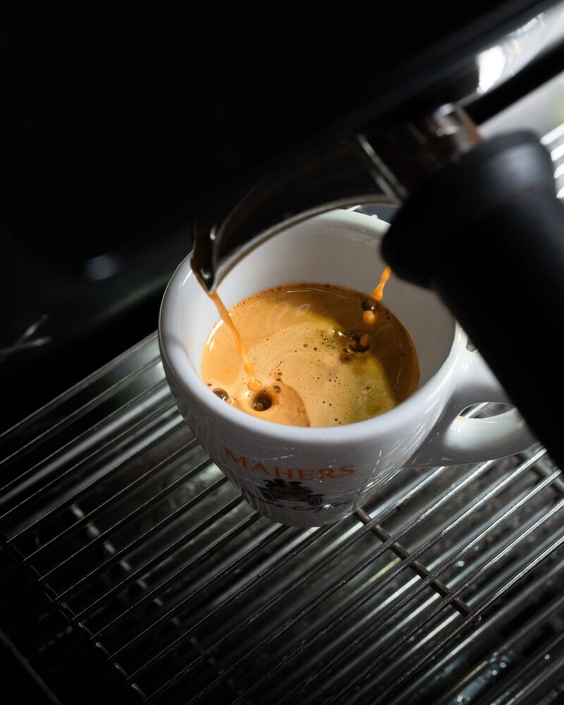 Espresso pouring into a Mahers cup
